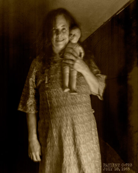 Patient C-723 with her doll